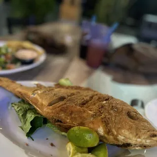 a whole fish on a plate