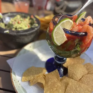 a plate of chips and salsa