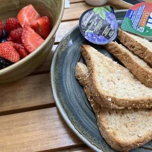 Multigrain toast and bowl of fruit