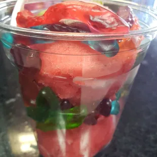 Watermelon ice with gummy worms