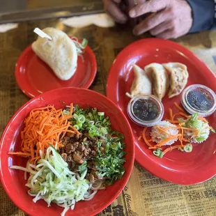 Duck 1 Steamy Bun (Bao), 1 Original Potstickers (Jiao Zi), Za Jiang Mian