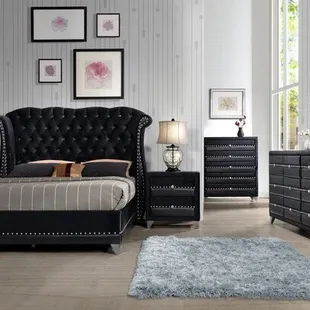 Velvet black tufted bed