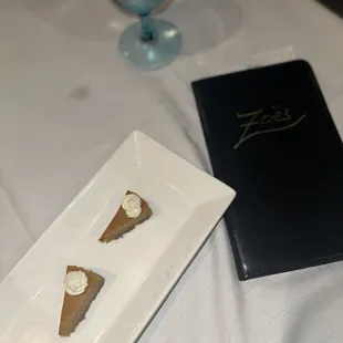 Tiny little pumpkin pies served with the check
