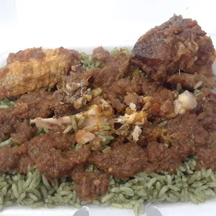 Chicken and fish gravy with rice after assembled.