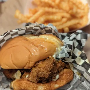 Pineapple curry chicken sandwich and fries