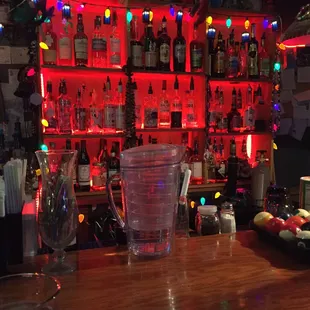 a bar with a lot of bottles