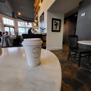 a coffee cup on a table