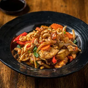 a plate of stir fried vegetables