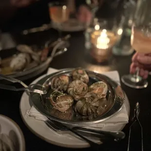 a plate of clams on a table