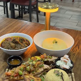 Food, meat, fish, Attieke, rice, fried plantains, fufu and egusi soup