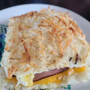 Hash brown sandwich with ham.