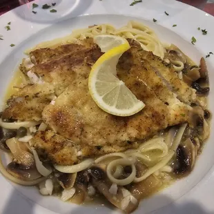 Chicken Piccata - Sauteed white wine, butter, fresh squeezed lemons, capers, and mushrooms. Served with linguine.