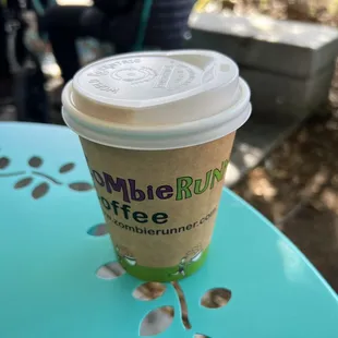 a cup of coffee on a table