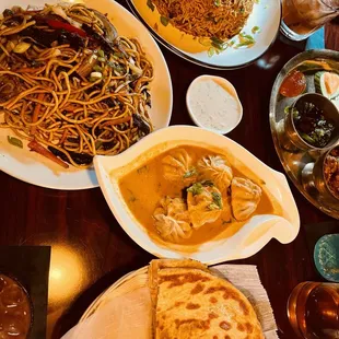 Dumpling with soup, chicken Biryani, dried meat fried Noodles