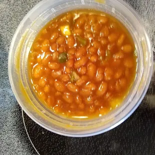 Baked beans with chopped green peppers and onions. Delicious