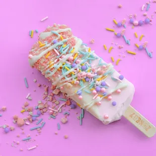 an ice cream covered in sprinkles