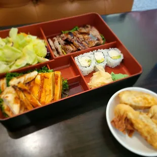 Chicken,beef teriyaki, salad, California rolls and egg rows