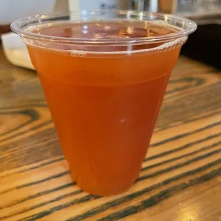 a plastic cup filled with liquid
