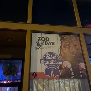 a sign in the window of a restaurant