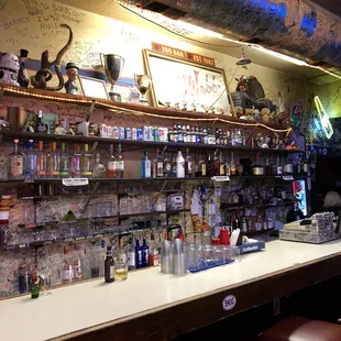 a variety of liquor bottles on shelves