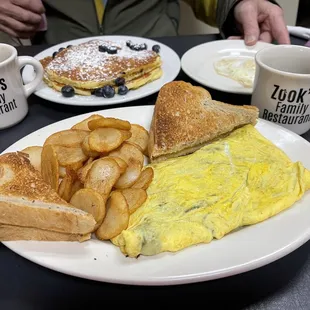 Mushroom, Bacon and Cheese Omelet w/Rye Toast.  Blueberry Pancakes