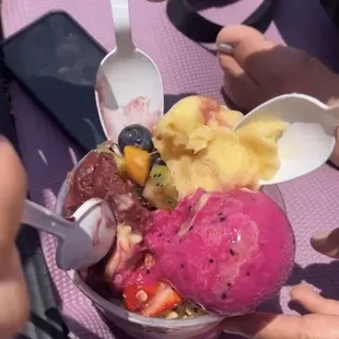 Mango, dragon fruit, and Acai large bowl! You cannot go wrong with any of his flavors!! Love the coconut and passion fruit too!!!