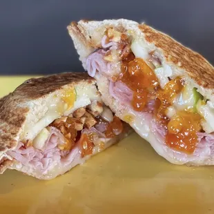 Thinly sliced ham, Brie cheese, sliced apples, roasted almonds and apricot preserves