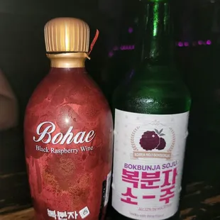 Bokbunja (Korean black raspberry) wine with bokbunja flavored Soju. Mix it, it's really good!
