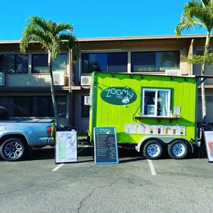 a food truck parked in front of a building
