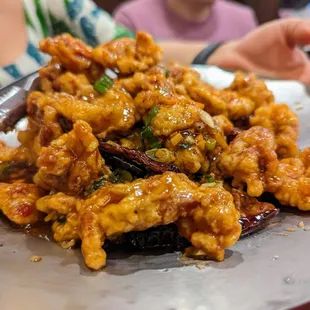 Kan Poong Ki. $22.95. Fried chicken in sweet and sour garlic sauce with spicy peppers and vegetables.