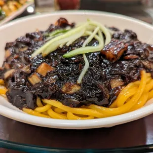 Jjajang Myun. $7.95. Noodles with black bean sauce, pork, and vegetables.