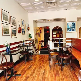 a dining room with wood floors