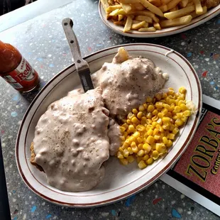 Country Fried Steak with Real Lumpy Mashed Potatoes only $9.45 with Soup or Salad, you will never beat that price