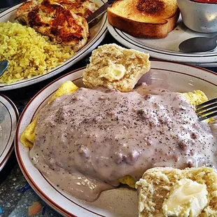 Chicken Breast Rice n Red Sauce Bean n Ham Soup Country Omelette stuffed with all the Meats Smothered in Gravy with a Biscuit