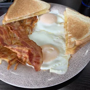 Perfectly basted eggs!  This is the benchmark by which to measure all basted eggs. Antonio has mad skills!