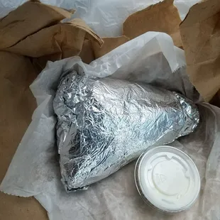 A big silver wrap! I wonder what's inside?