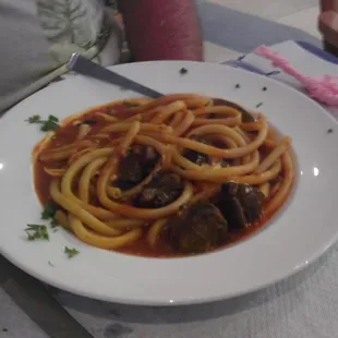 yiouvetsada sti gastra - chunks of lamb, slowly simmered w/ Greek pasta in tomato sauce