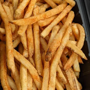 Frozen fries with coating/batter.