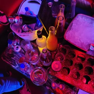 a table with drinks and snacks