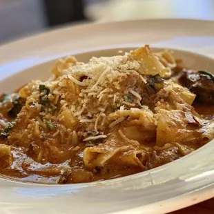 a pasta dish with meat and vegetables