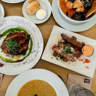 ciopinno, pistachio crusted sea bass, eggplant fries, famous lentil soup