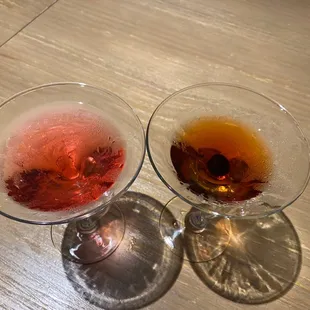 two glasses of wine on a table