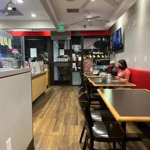 2 other people practicing a zen level of patience while they wait.  Rumor has it they were here since mid-2021