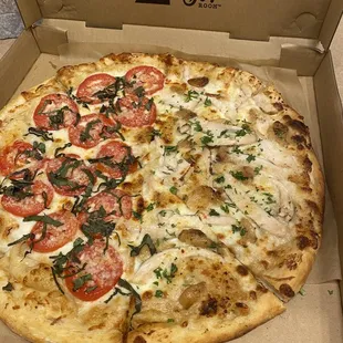 a pizza in a pizza box