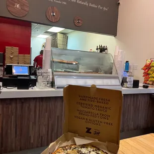 a pizza in a pizza box