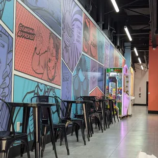 Side seating and arcade games to pass the time