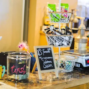 a counter with various items on it