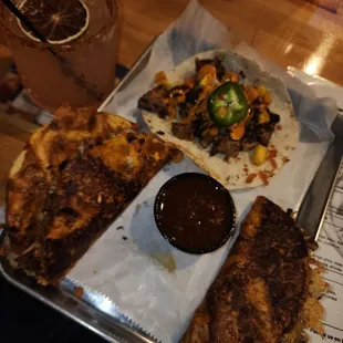 Chicken Birria taco, watermelon margarita, fish taco