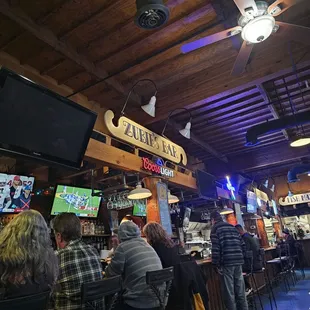 Full bar with a large amount of seating.