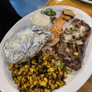 NY Steak &amp; Shrimp with a side of Grilled Corn and Baked Potato